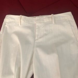 White pants with tiny tucks